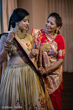 Indian bride being assisted by special guest. Indian bride being assisted by special guest.