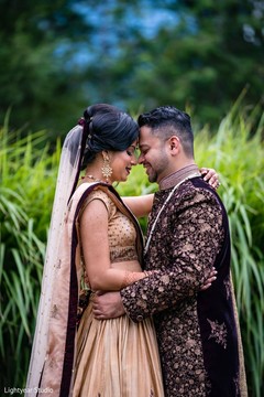 Indian bride and groom posing for pictures. Indian bride and groom posing for pictures.