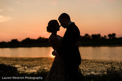 Romantic Indian bride and groom silhouette capture. Romantic Indian bride and groom silhouette capture.