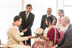 Indian groom about to put the Mangalsutra chain. Indian groom about to put the Mangalsutra chain.