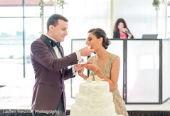 Indian groom giving cake to bride. Indian groom giving cake to bride.