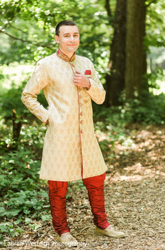 Charming indian groom posing outdoors. Charming indian groom posing outdoors.