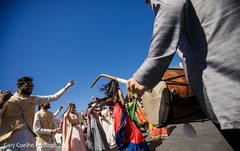 Dhol player during the baraat. Dhol player during the baraat.