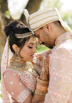 Indian bride and Raja posing for pictures. Indian bride and Raja posing for pictures.