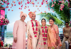 Indian groom and bride with family. Indian groom and bride with family.