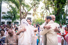 Newlyweds with family members. Newlyweds with family members.