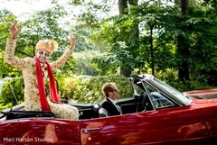 Elegant Indian groom on his baraat vehicle. Elegant Indian groom on his baraat vehicle.