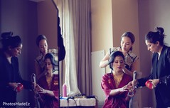 Lovely Indian bride getting her hair done. Lovely Indian bride getting her hair done.