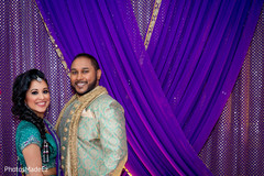 Dreamy Indian couple posing at sangeet. Dreamy Indian couple posing at sangeet.