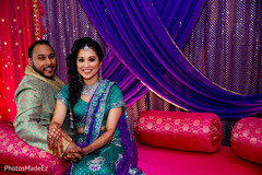 Indian lovebirds posing at Sangeet mandap. Indian lovebirds posing at Sangeet mandap.