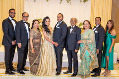 Indian couple posing with relatives. Indian couple posing with relatives.