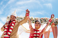 Joyful Indian couple at ceremony ending. Joyful Indian couple at ceremony ending.