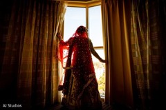 Indian bride looking through the window. Indian bride looking through the window.