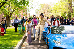 Indian groom jumping out of his baraat car. Indian groom jumping out of his baraat car.