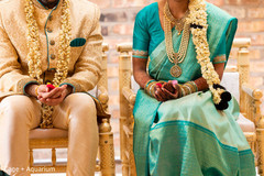 Indian couple holding the red petals. Indian couple holding the red petals.
