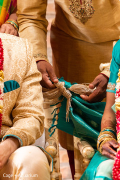 Closeup capture of the Indian wedding knot ritual.