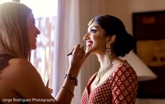 Maharani being assisted by makeup artist. Maharani being assisted by makeup artist.
