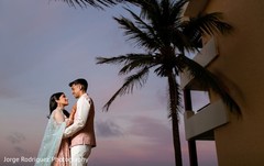 See this gorgeous couple posing outdoors. See this gorgeous couple posing outdoors.