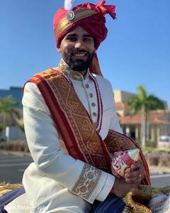 Indian grooms capture on his baraat horse. Indian grooms capture on his baraat horse.