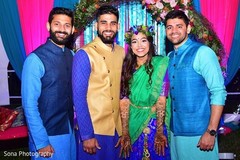 Indian couple posing with groomsmen. Indian couple posing with groomsmen.