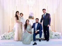 Stunning photo of this lovely Indian couple with relatives. Stunning photo of this lovely Indian couple with relatives.