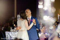 Indian bride dancing with her father capture. Indian bride dancing with her father capture.