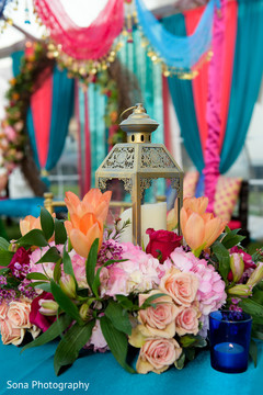 Lovely Sangeet table centerpiece decoration. Lovely Sangeet table centerpiece decoration.