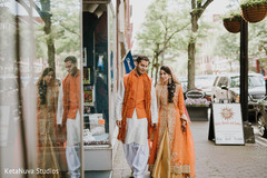 Awesome photo of our Indian couple walking on the street. Awesome photo of our Indian couple walking on the street.
