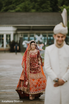 Charming Indian bride coming to meet her groom. Charming Indian bride coming to meet her groom.