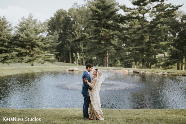 Indian couple in front of an amazing lake.