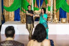 Indian bride's parents dancing at sangeet. Indian bride's parents dancing at sangeet.