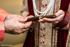 Indian groom receiving gift. Indian groom receiving gift.