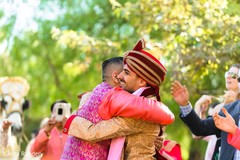 Indian groom hugging one of his groomsmen. Indian groom hugging one of his groomsmen.