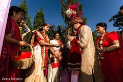 Indian groom being greeted by his mother in law. Indian groom being greeted by his mother in law.
