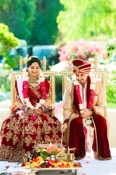 Charming Indian couple during Agni ceremony. Charming Indian couple during Agni ceremony.