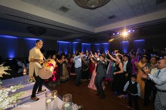 Guests at the reception enjoying the drum show. Guests at the reception enjoying the drum show.