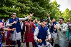 Indian groomsmen dancing during baraat Indian groomsmen dancing during baraat