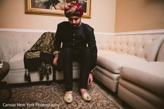 Indian room putting his mojaris on. Indian room putting his mojaris on.
