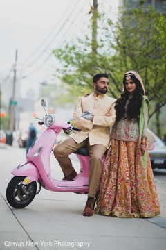 Marvelous Indian bride and groom on sangeet outfits. Marvelous Indian bride and groom on sangeet outfits.