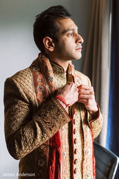 Rajah getting his sherwani on. Rajah getting his sherwani on.
