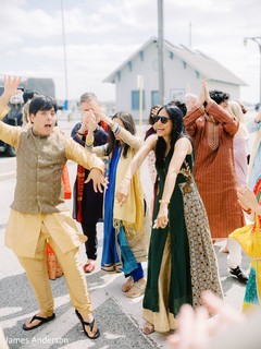 Upbeat Indian wedding guest at baraat procession. Upbeat Indian wedding guest at baraat procession.