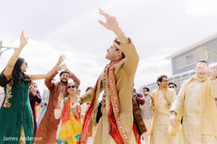 Indian groom dancing at baraat procession. Indian groom dancing at baraat procession.