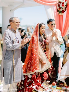 Indian bride with relatives at her ceremony capture. Indian bride with relatives at her ceremony capture.