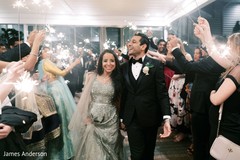 Dazzling Indian bride and groom walking down the aisle. Dazzling Indian bride and groom walking down the aisle.