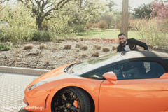 Groom with his ride. Groom with his ride.