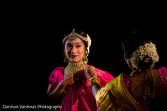 Sweet indian bride's mother helping her to get ready Sweet indian bride's mother helping her to get ready
