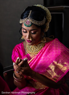 Sweet indian bride putting bangles on Sweet indian bride putting bangles on