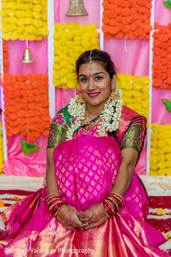 Sweet Indian bride at her pre-wedding celebration. Sweet Indian bride at her pre-wedding celebration.
