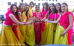 Joyful Indian bride and bridesmaids having cheers. Joyful Indian bride and bridesmaids having cheers.