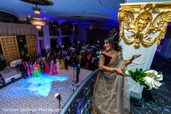 Maharani throwing her bouquet at reception party. Maharani throwing her bouquet at reception party.